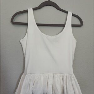 White Sleeveless Peplum Top